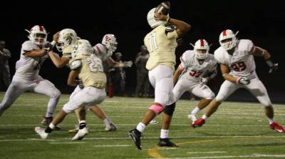 Tigers overwhelmed by unbeaten rival