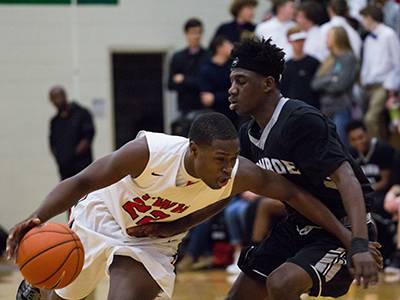 BASKETBALL: The Woodlands claims win over Conroe 61-47 in district opener