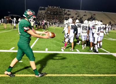 Highlander football shuts out Conroe Tigers