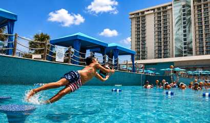 /images/newsimage/10894/410x240/KidCatchingFootballinPool.jpg