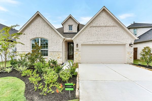 Front yard and exterior of 13043 Soaring Forest Dr